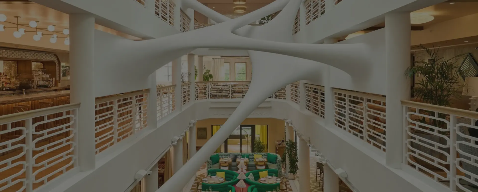 The Moore atrium in the Miami Design District, with Zaha Hadid’s Elastika sculpture arcing above the restaurant below