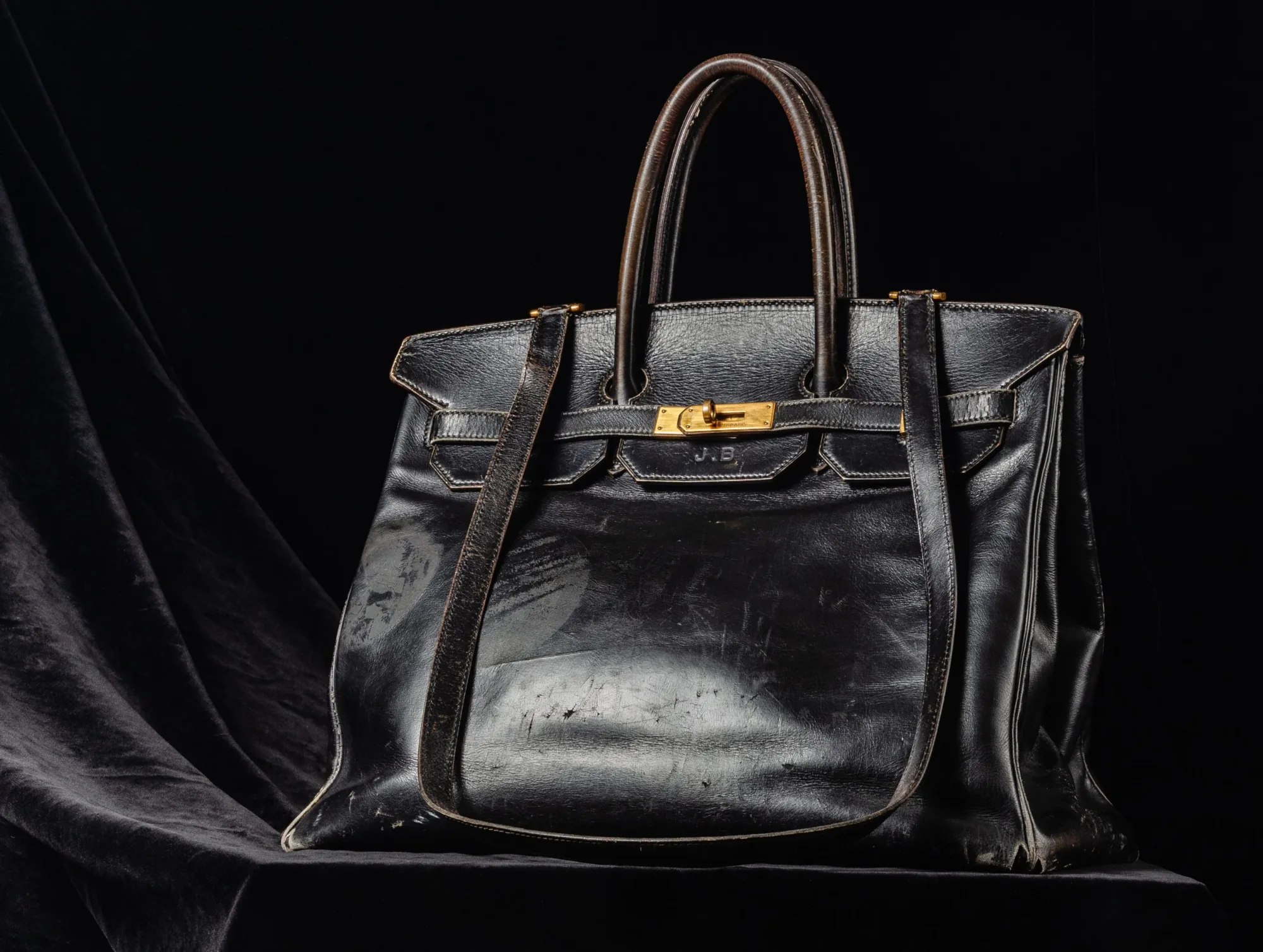 The original Hermès Birkin made for Jane Birkin, embossed J.B., on black velvet
