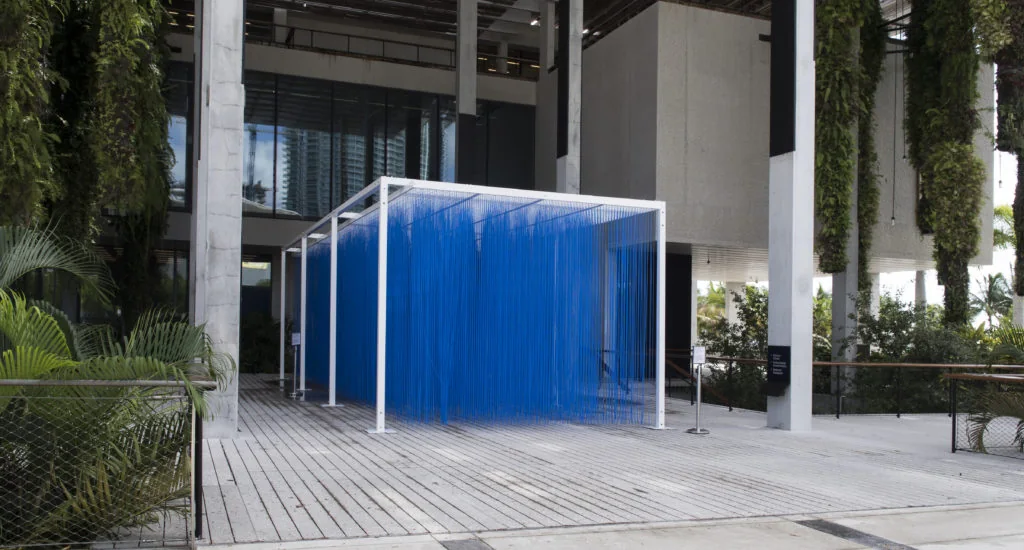 A blue Penetrable by Jesús Rafael Soto on the terrace of the Pérez Art Museum Miami