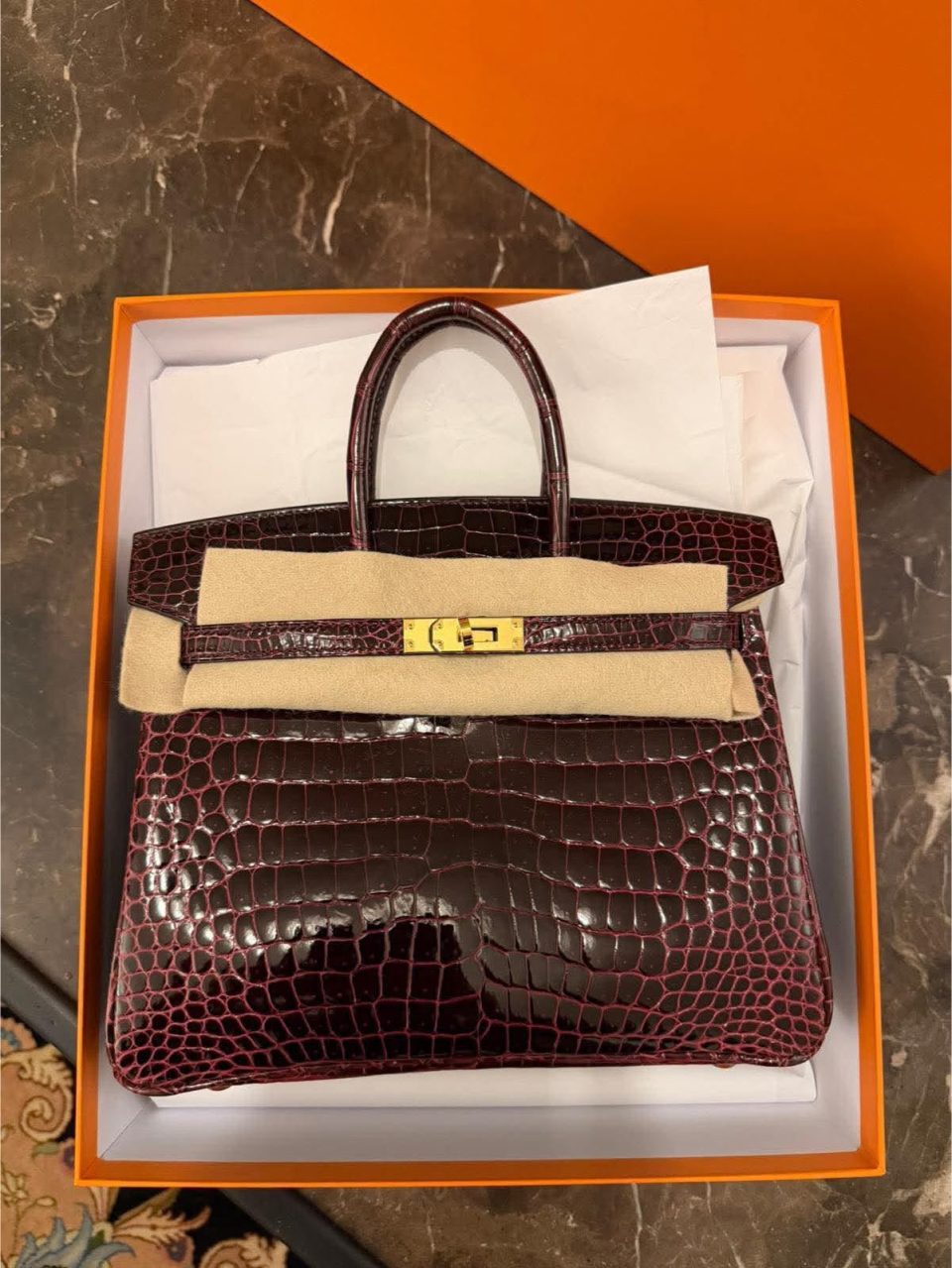 Birkin 25 Bordeaux Porosus Crocodile Gold