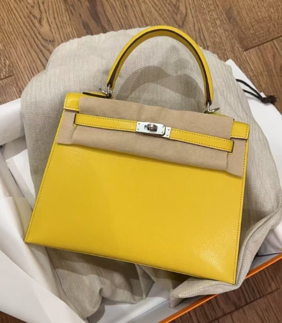 Kelly 25 Jaune de Naples Chevre Palladium