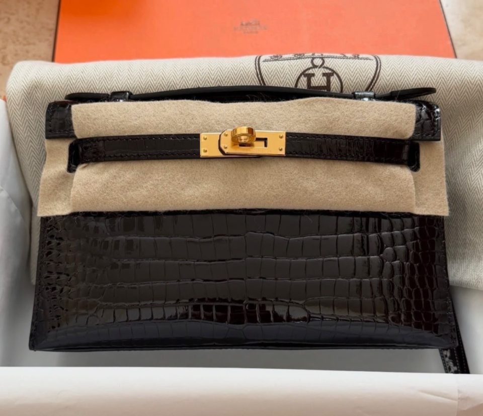 Kelly Pochette Black Porosus Crocodile Gold